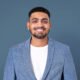 Cheerful Indian businessman smiling closeup portrait for jobs and career campaign